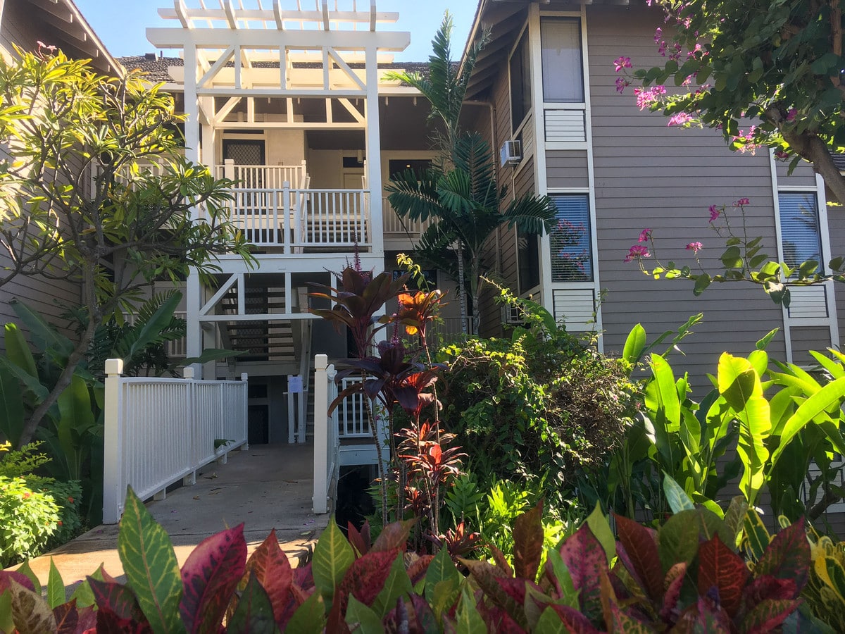 Entry walkway and tropical landscaping at Grand Champions Villas