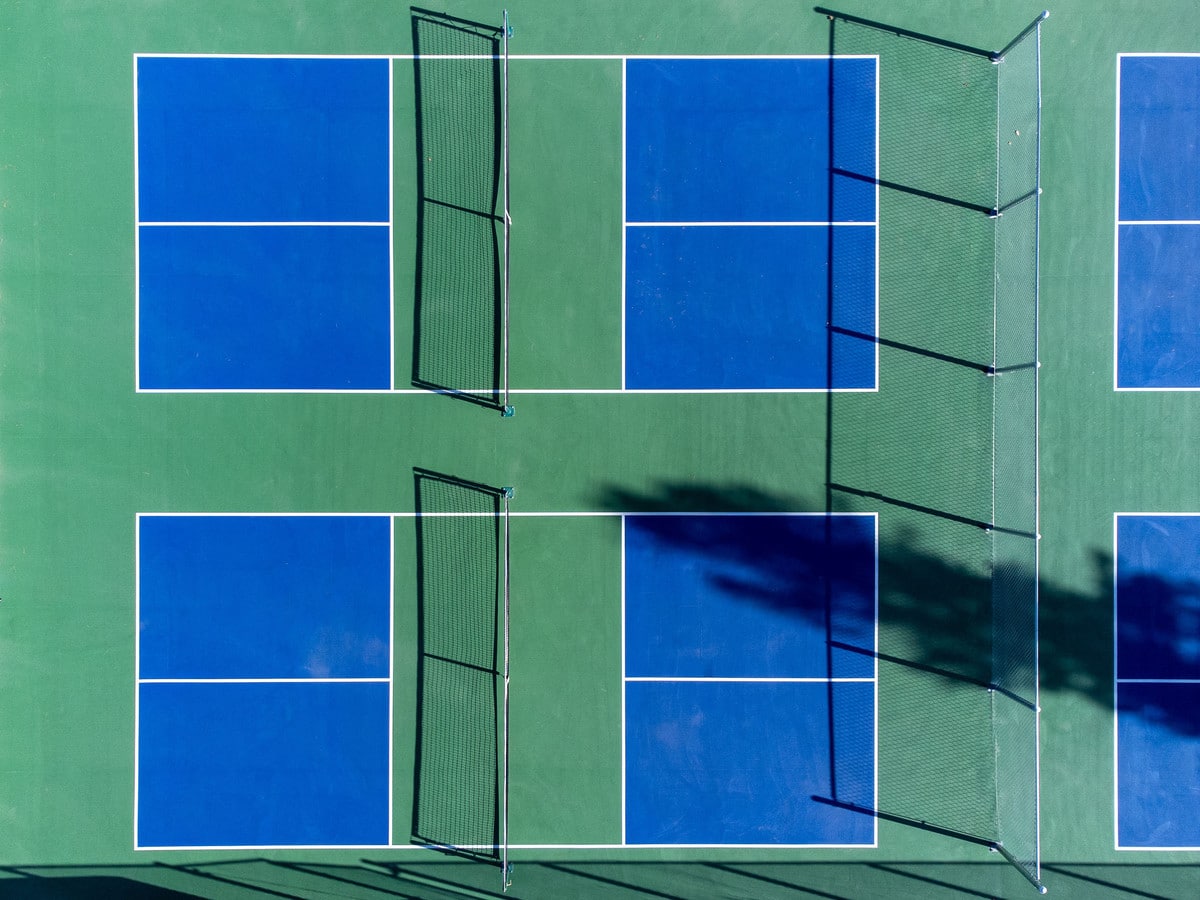 Aerial view of blue and green pickleball courts