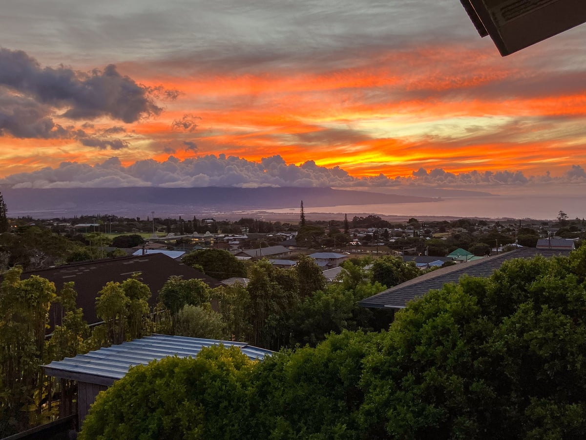 Orange sunset over Maui seen from Makawao in Upcountry