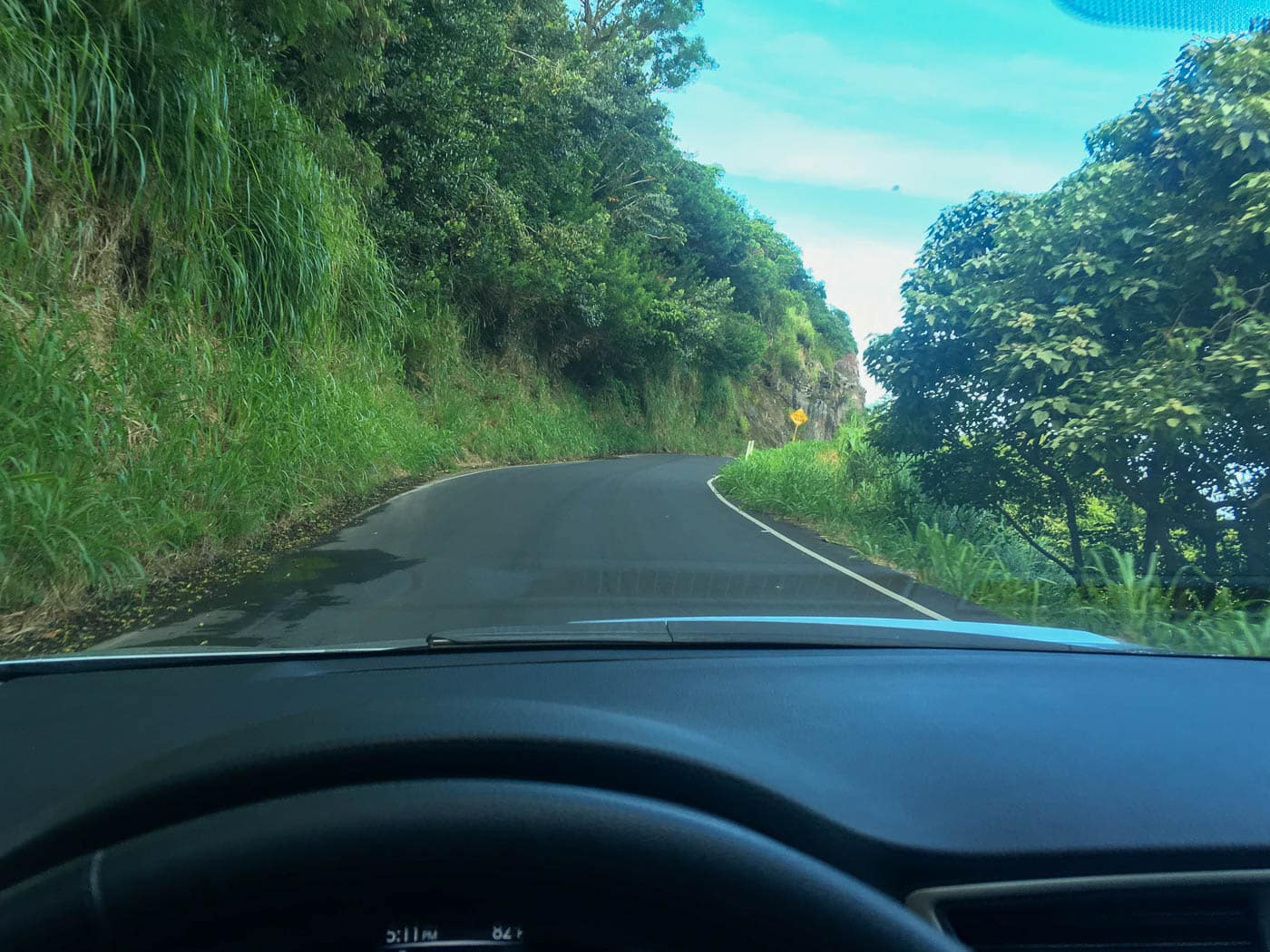 View from a rental car on a narrow jungle stretch of the Road to Hana