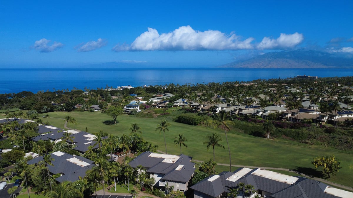 Aerial view of Wailea, the South Maui coast and the West Maui Mountains on a clear day